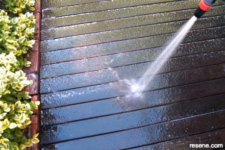 Ensure decking is thoroughly rinsed with water