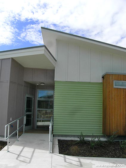 Green and white school exterior