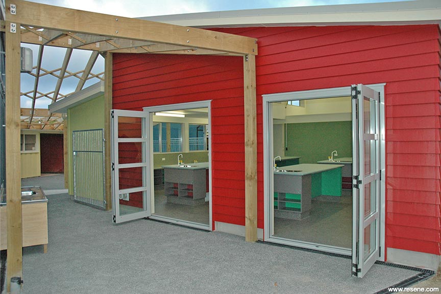 Bold red and green school exterior