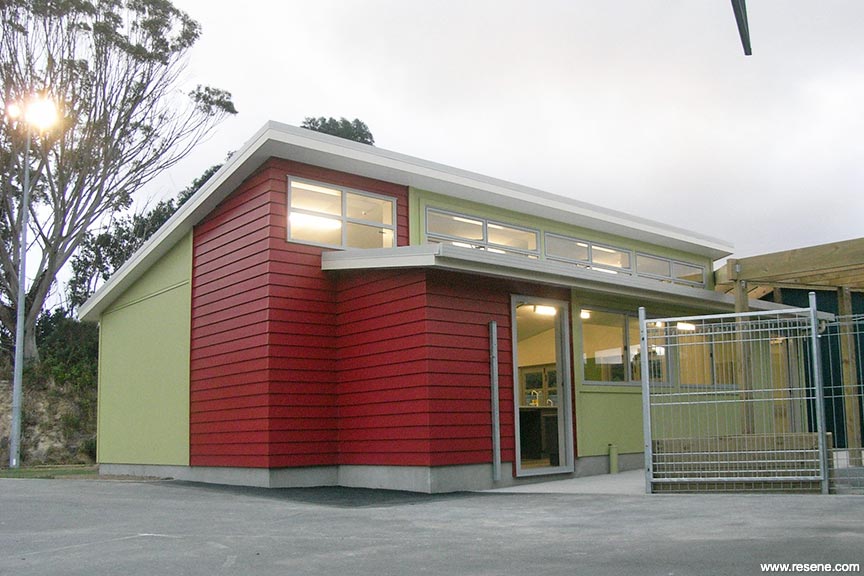 Red and green school exterior