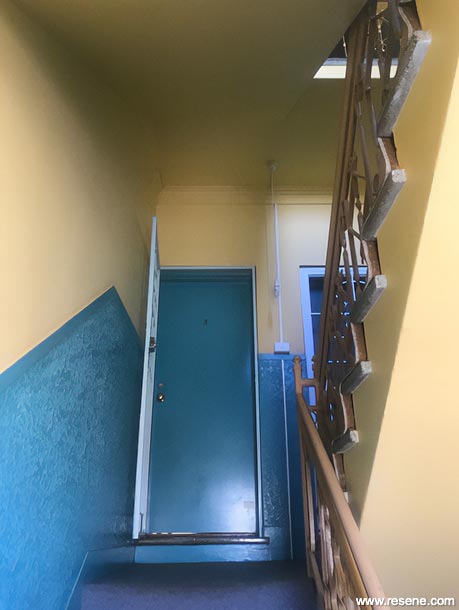 Outdated blue and yellow staircase