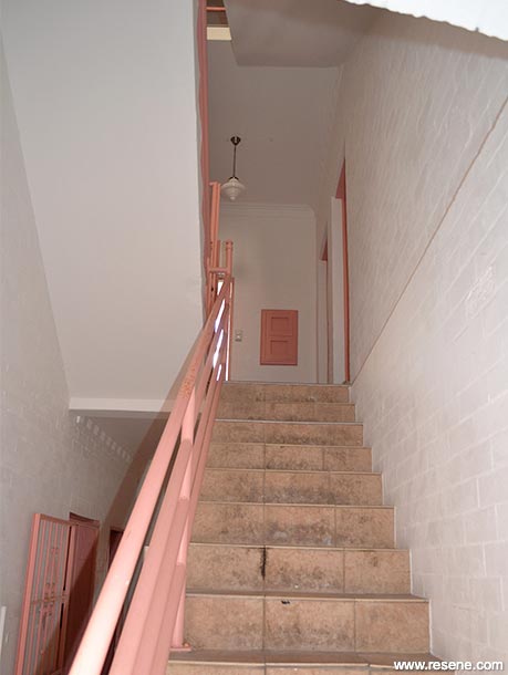 Pink and white art deco staircase