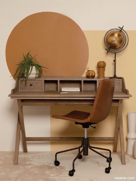 A rustic gold, caramel, and cream home office