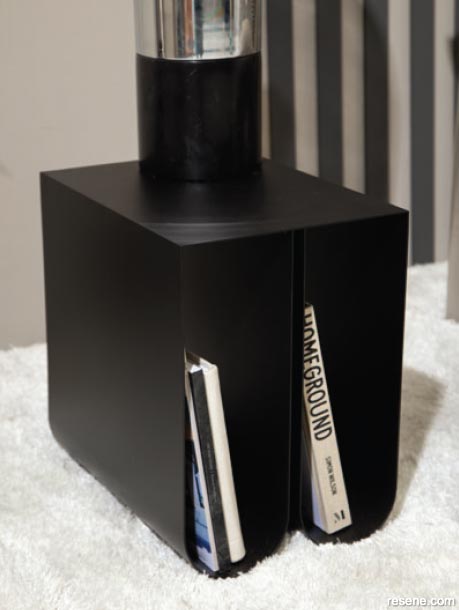A black curved side table