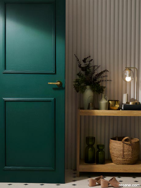 A welcoming green home entryway in Resene Palm Green