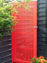 How to brighten up a plain wooden garden gate
