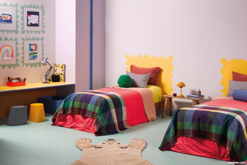 An artsy kids bedroom with a squiggle design
