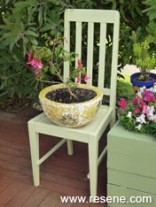 Make a plant stand from a chair.