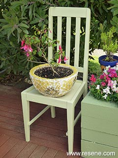 Turn an old chair into an outside plant stand